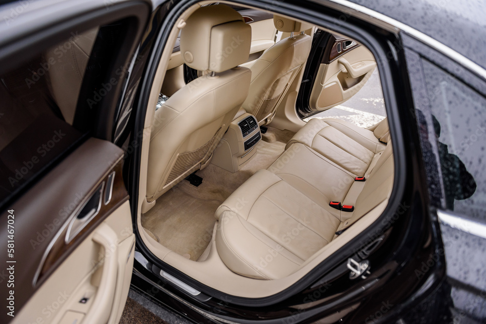 Open passenger door rear left, right. Leather clean interior design