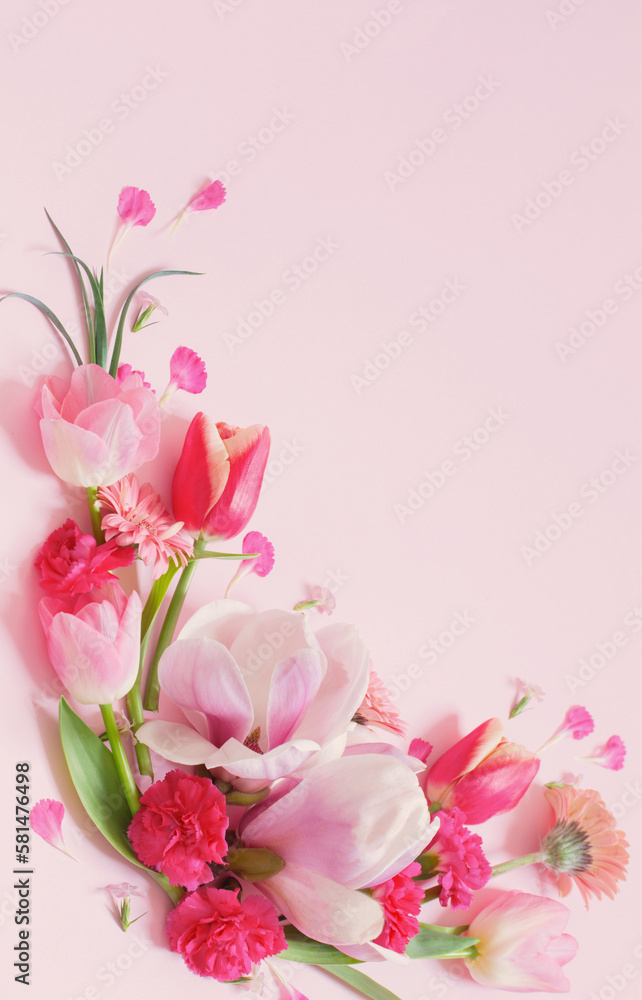 Fototapeta premium beautiful spring flowers on pink background