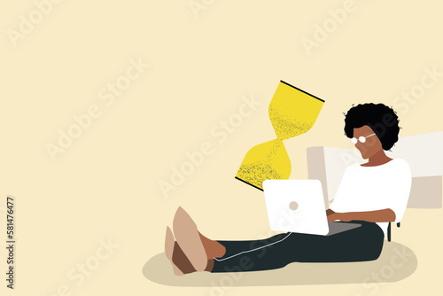 business woman using laptop with an hourglass. concept of multitasking, productivity and time management