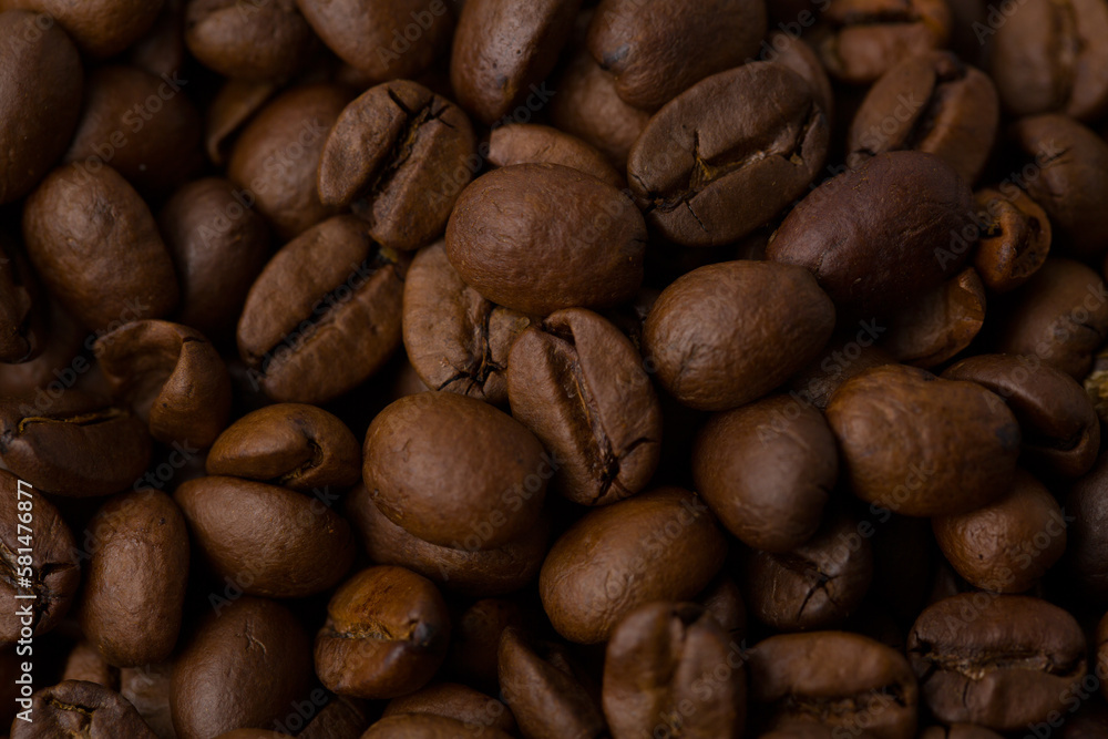 Naklejka premium Roasted coffee beans background abstract