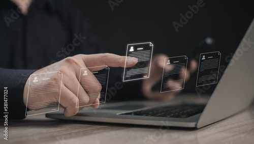 Concepts of practices and policies Company articles association forTerms and Conditions : Businessman using finger to select electronic document on a digital document in a virtual screen to read. 