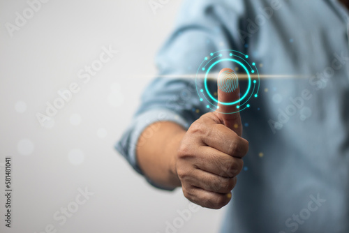 Man scans finger through touch screen