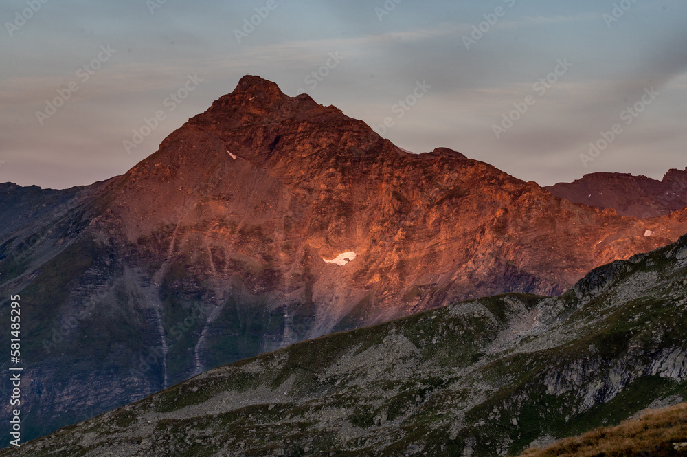 Sunset on top of a mountain in the mountains
in the Austrian Alps in the Hohe Tauern mountains