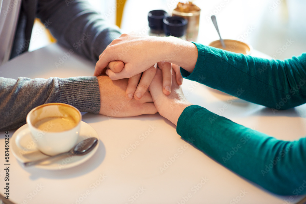 Fototapeta premium Coffee and romance. two unrecognizable young people on a coffee date.