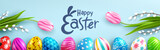 Easter banner template with Easter eggs and flower on light green background.Greetings and presents for Easter Day in flat lay styling.Promotion and shopping template for Easter