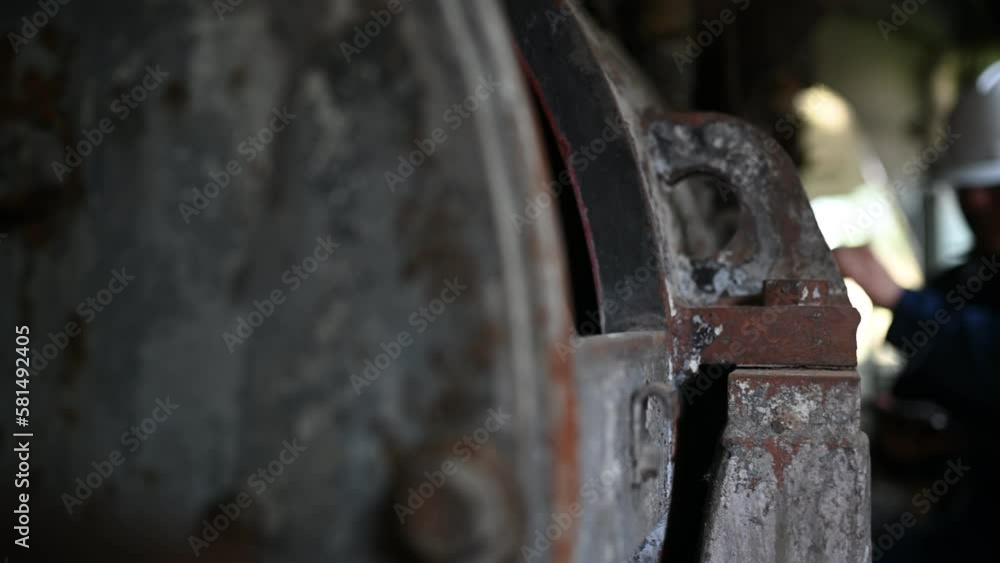 Engine engineer inspecting large machines in factory,Railway engine maintenance technician,engine repair mechanical manager Engine engineer inspecting large machines in factory,Railway engine maintenance technician,engine repair mechanical manager