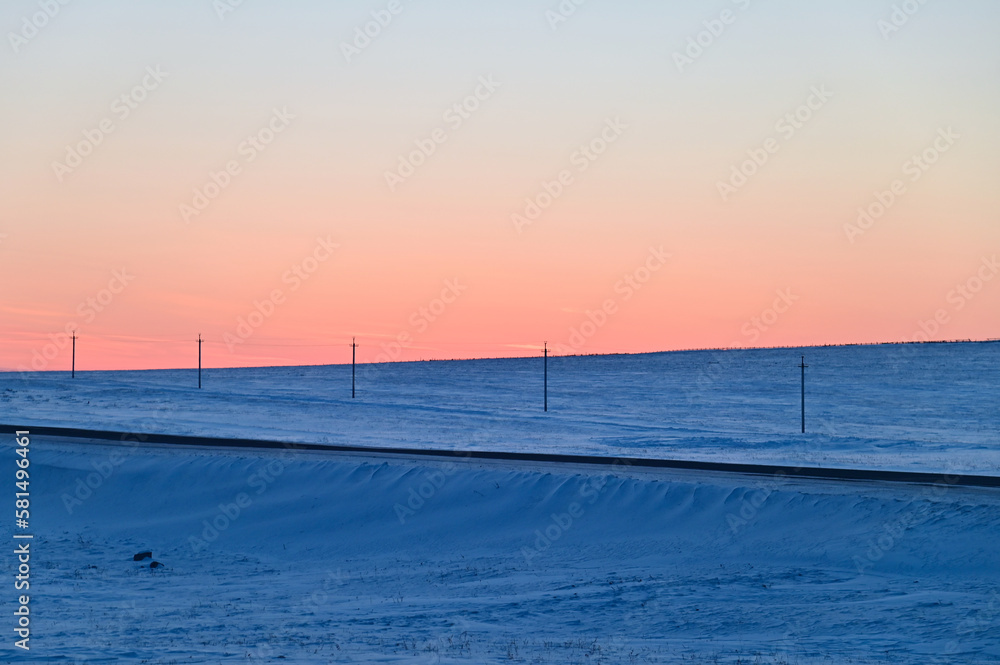 Orange Twilight Sky Over Snow Hills in Irkutsk Oblast, Siberia