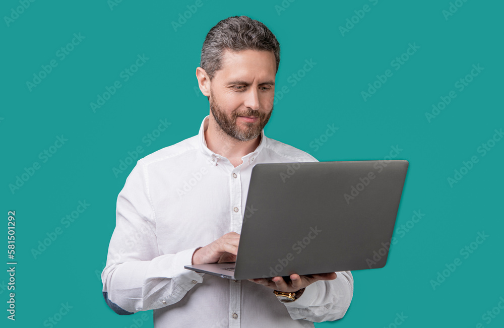 businessman freelance typing on pc isolated on blue background. businessman freelance businessman freelance typing on pc isolated on blue background. businessman freelance