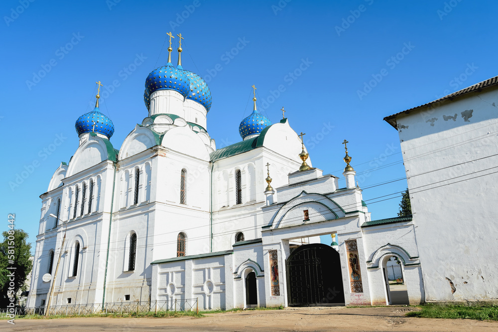 white orthodox church with blue domes on a sunny summer day white orthodox church with blue domes on a sunny summer day