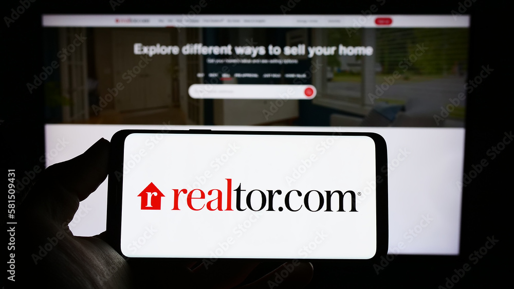 Stuttgart, Germany 03102023 Person holding mobile phone with logo