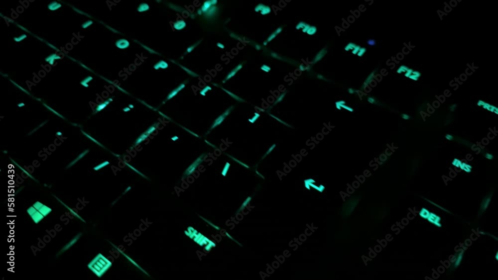 a close-up night view of the illuminated keyboard. a close-up night view of the illuminated keyboard.