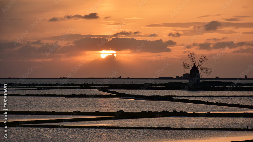 sunset watching at saline near town Marsala in Sicily,I