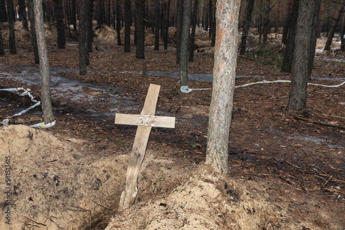 Mass grave site near Izium for civilian victims of war photo