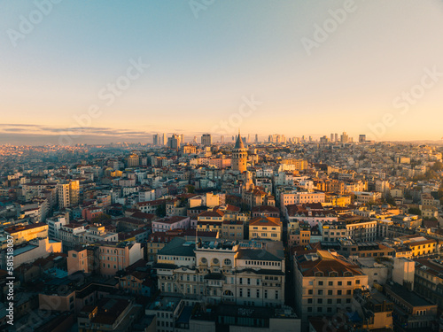 Aerial view of the Galata tower and skyline of Istanbul at sunrise. 