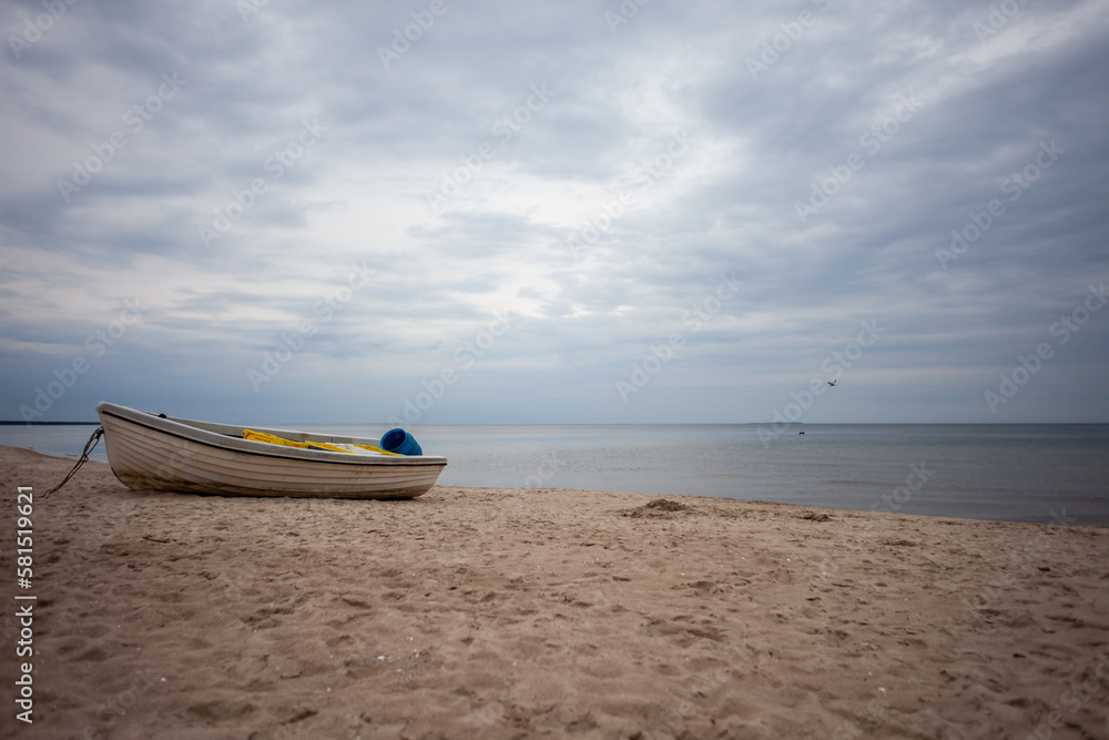 Abounded small boat at the coast of the Baltic Sea in Germany 