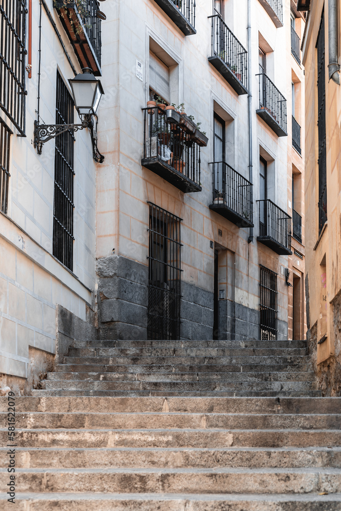 Staircase on a narrow street in the historic center of Madrid. Slow and city travel concept