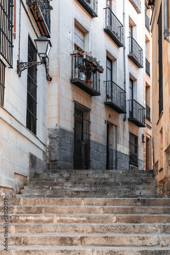Staircase on a narrow street in the historic center of Madrid. Slow and city travel concept