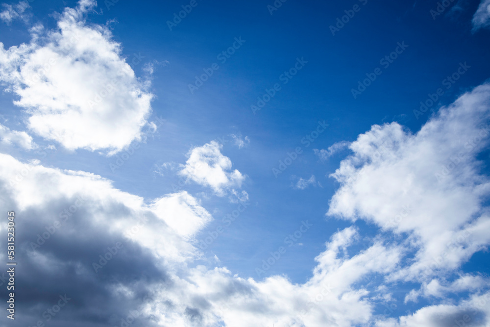 Naklejka premium Blue Sky. Heaven. Сlouds. Sunlight. Background