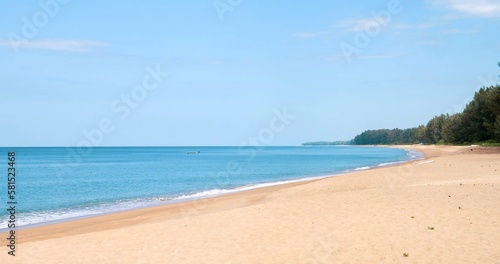 Summer exotic sandy beach and blue sea on background
