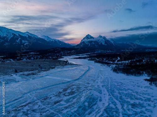 ose peach clouds over Mount William Booth, rhine peak and Siffleur river during sunrise in canadian rockies mountains