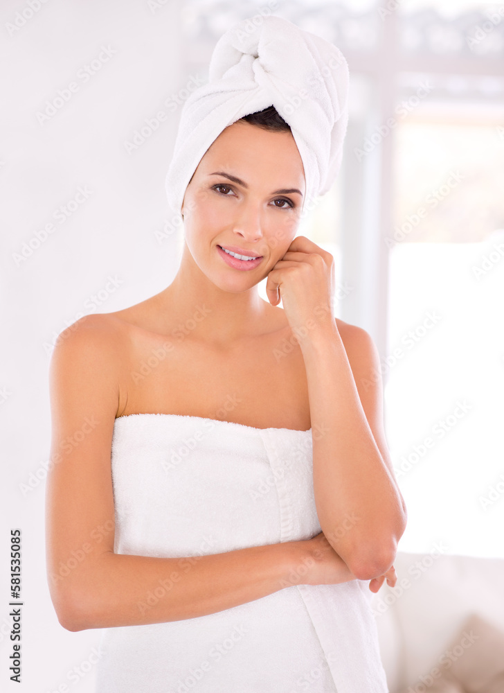 Beauty time. A beautiful woman standing with her towel wrapped around her body. Beauty time. A beautiful woman standing with her towel wrapped around her body.