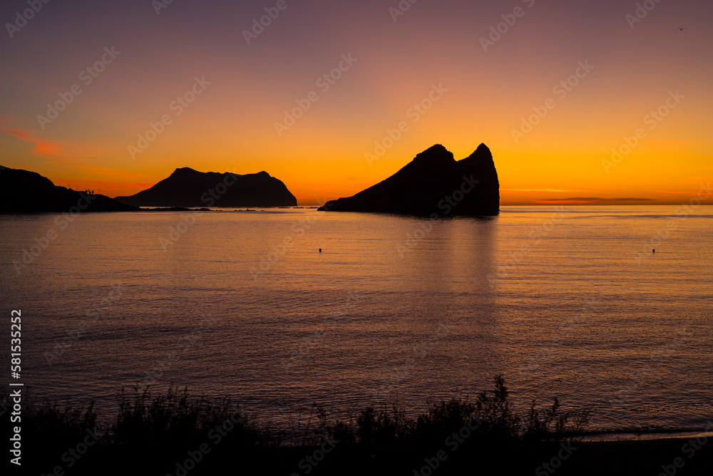 sunrise in the Mediterranean sea with the Isla del Fraile in the background, Aguilas, Spain