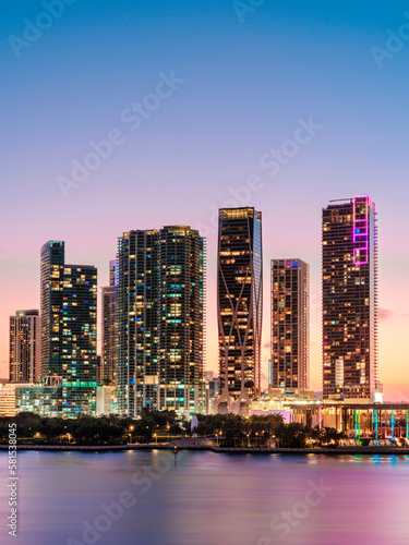 Skyline of Miami Downtown at sunset,night illuminated..Floridas East Coast.Miami Florida USA © Earth Pixel LLC.