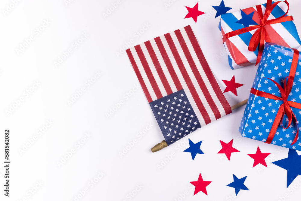 4th of July American Independence Day. Happy Independence Day. Red, blue and white star confetti, paper decorations on white background. Flat lay, top view, copy space, banner 4th of July American Independence Day. Happy Independence Day. Red, blue and white star confetti, paper decorations on white background. Flat lay, top view, copy space, banner