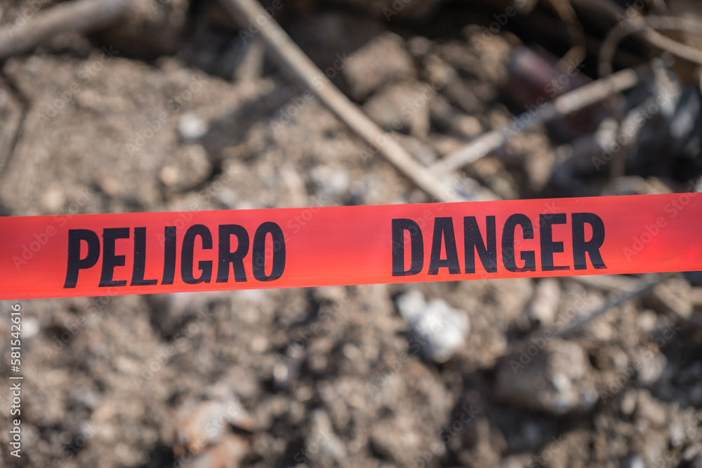 Red tape at accident or crime scene reading danger (English) and