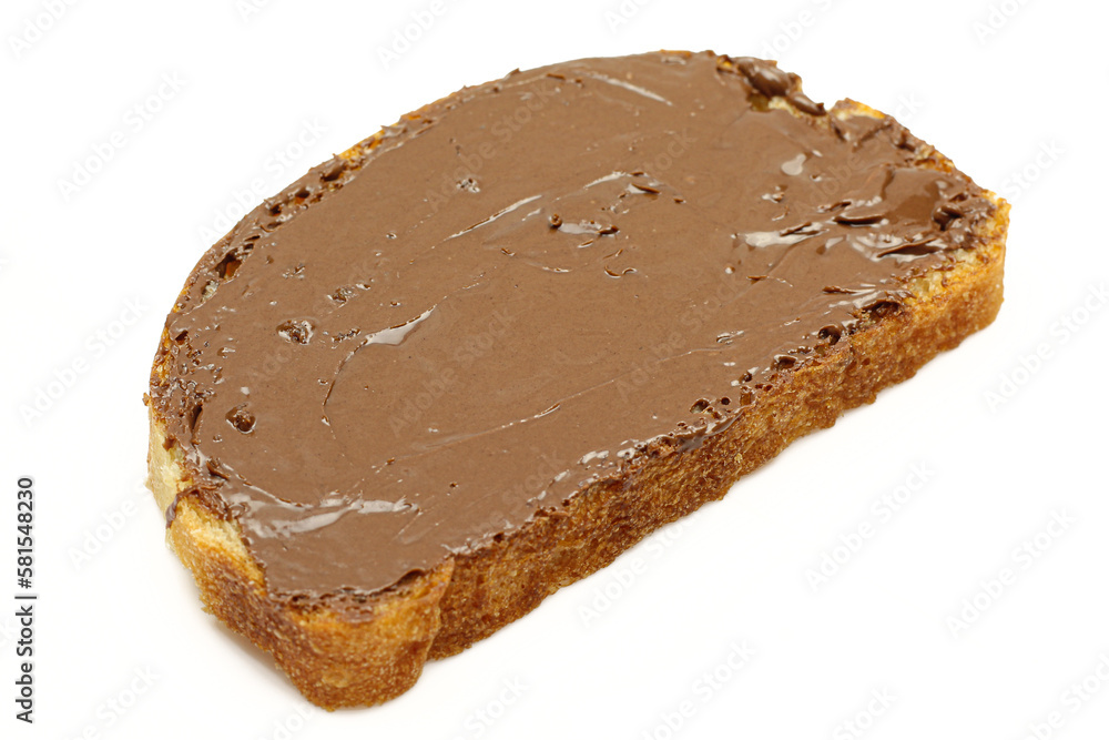 Bread slice with sweet chocolate cream spread on top isolated on white background Bread slice with sweet chocolate cream spread on top isolated on white background