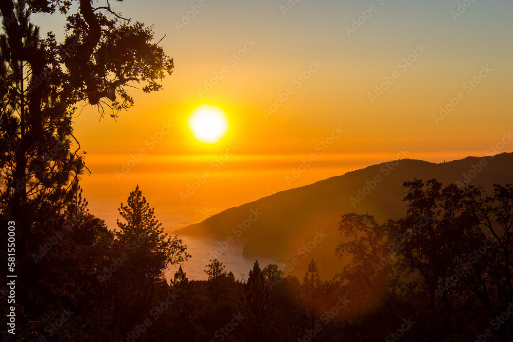 Sunset over the pacific at Big Sur. Camping on a mountain ridge.
