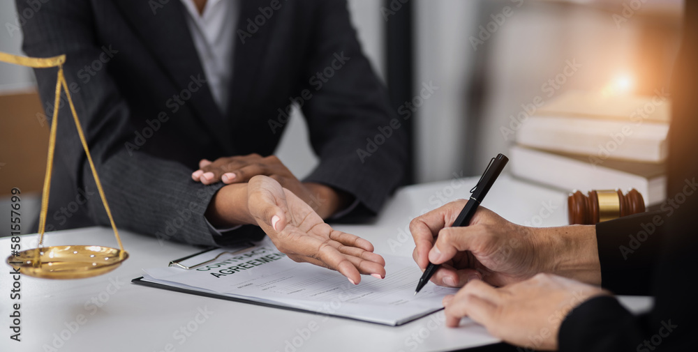 lawyer working with contract agreement at table office, law and justice concept, Selective focus. lawyer working with contract agreement at table office, law and justice concept, Selective focus.