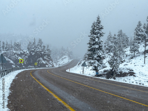 asphalt road in mountainous area and wonderful winter views
