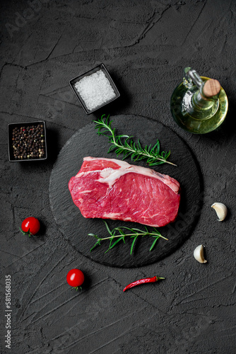 raw beef steak on stone background