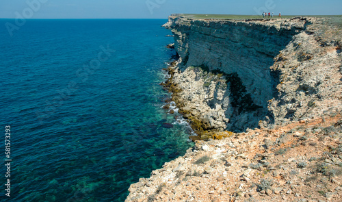 Steep karst limestone shores and rocks in the Dzhangul tract, western Crimea, Tarkhankut photo