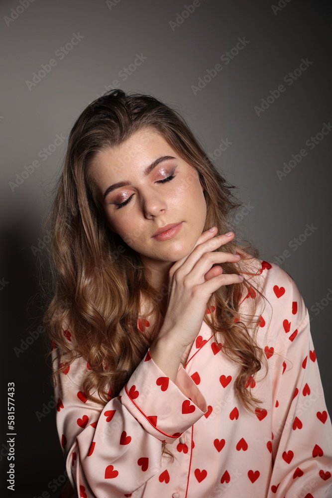 make-up blonde girl in pajamas heart print. fashion portrait. Valentine's day make-up blonde girl in pajamas heart print. fashion portrait. Valentine's day