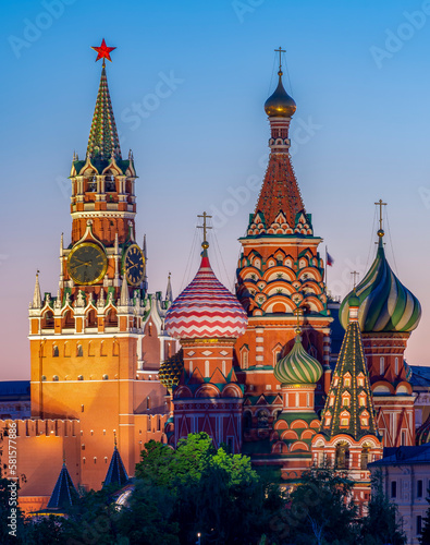 Cathedral of Vasily the Blessed (Saint Basil's Cathedral) and Spasskaya Tower of Moscow Kremlin on Red Square at sunset, Moscow, Russia