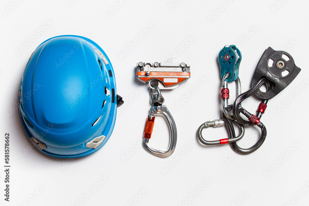 protective helmet for work at height. climbing equipment. fall protection mechanism. set of carbines. view from above. on a white background.