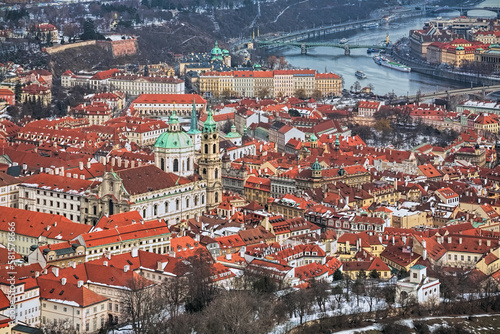 Obraz na płótnie Prague, Czech Republic. Mala Strana district with St. Nicholas Church in winter. Hight angle view from the lookout tower at Petrin Hill. w salonie