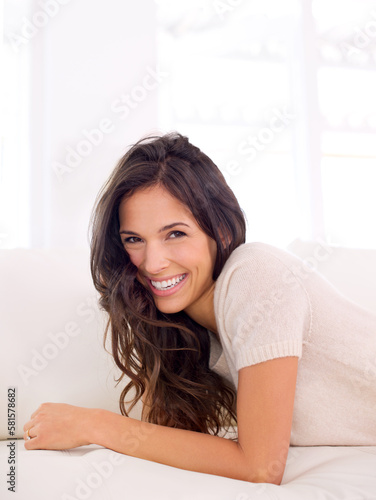 This is how relaxation is done. a gorgeous young woman on a couch. Free Download This is how relaxation is done. a gorgeous young woman on a couch. - GFXLoad