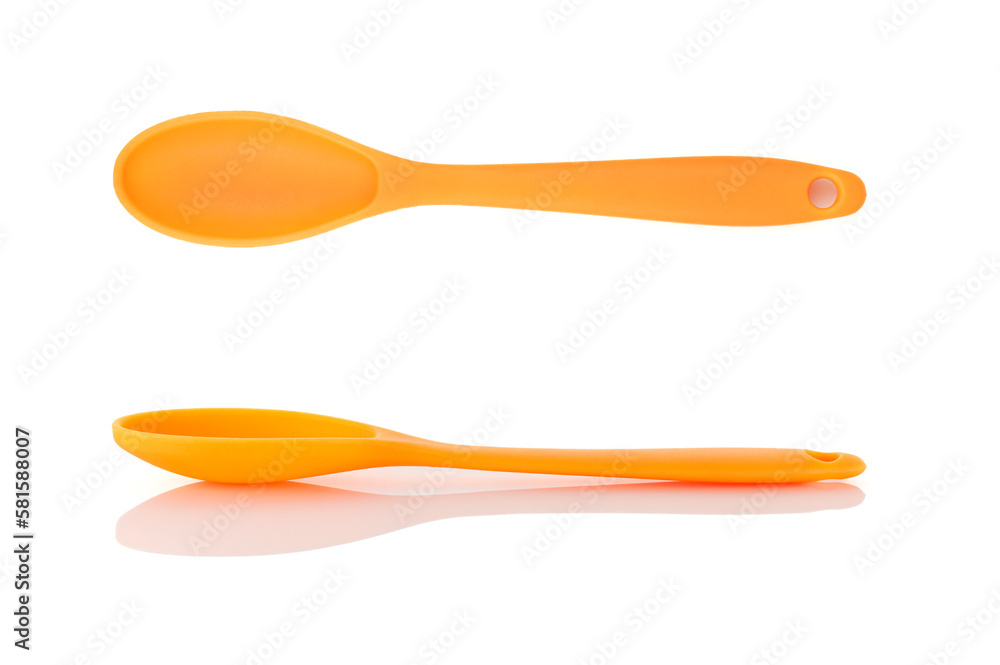Pastry silicone tools, spoon over white background. Close-up Pastry silicone tools, spoon over white background. Close-up
