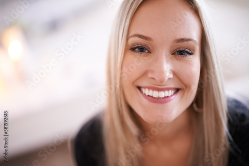 The smile that captivated a million hearts. Portrait of a young woman smiling broadly.