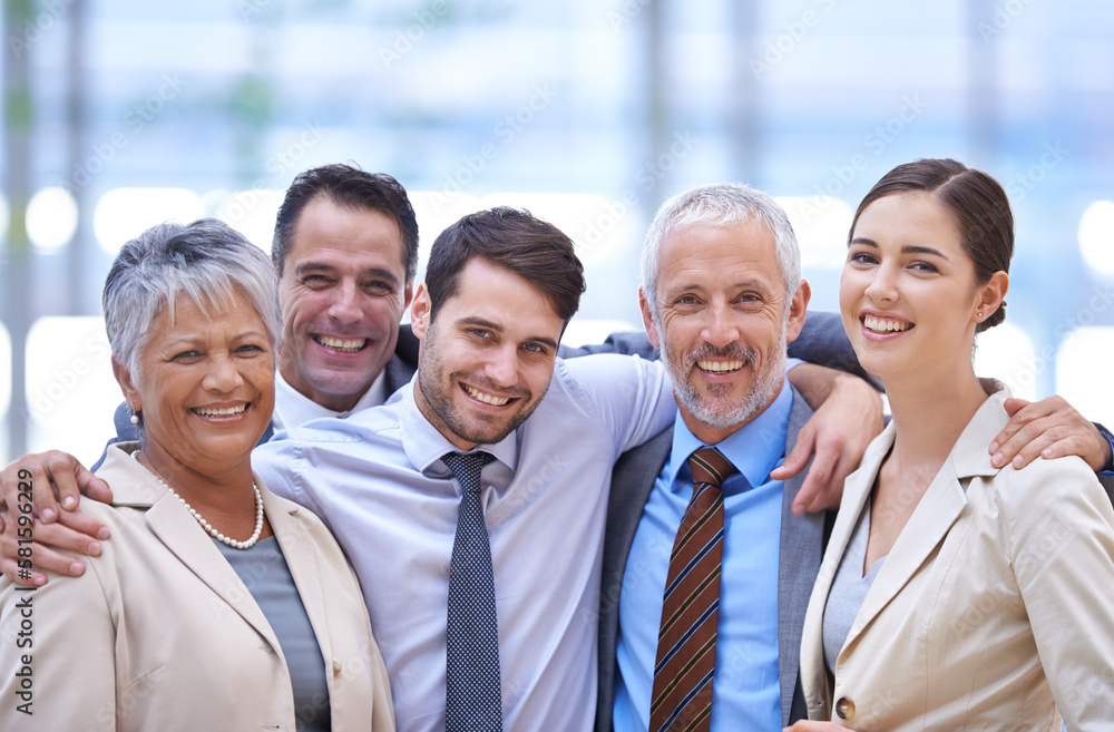 Obraz premium Happy to be part of a team. Cropped portrait of a group of businesspeople standing in the office.