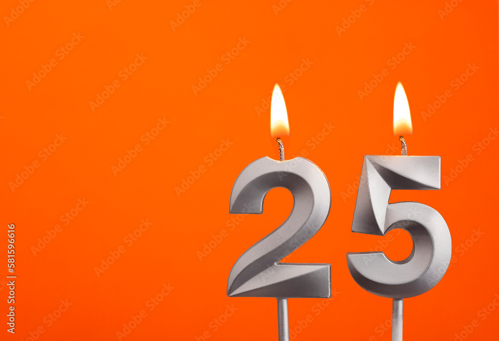 Candle number 25 - Birthday in orange background Candle number 25 - Birthday in orange background