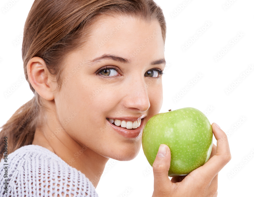 Take a bite of natures goodness. A young beautiful woman holding a green apple. Take a bite of natures goodness. A young beautiful woman holding a green apple.