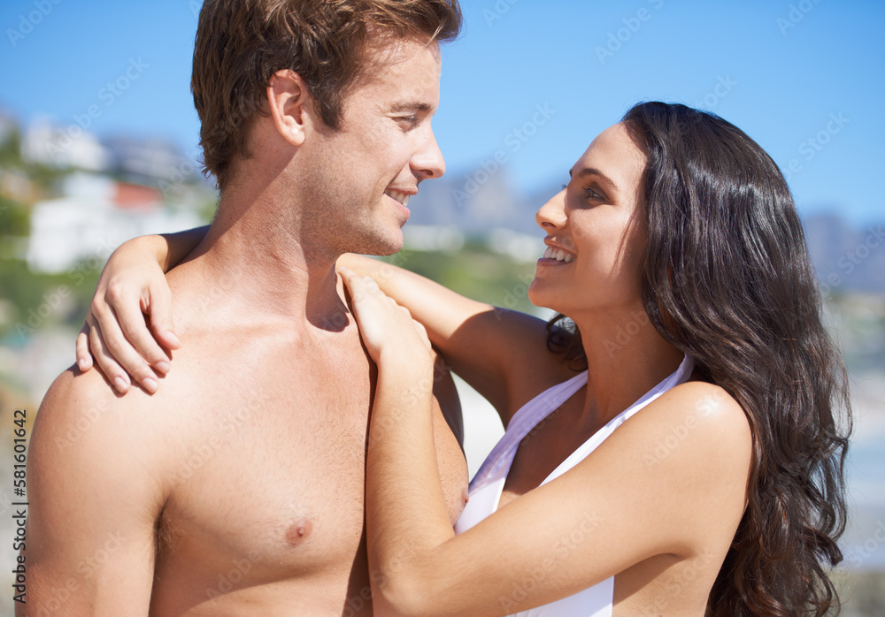 Thanks for the best vacation ever. A young couple embracing on the beach. Thanks for the best vacation ever. A young couple embracing on the beach.