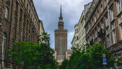 Time lapse of heavy rain clouds rolling behind Palace of Culture and Science viewed from Emilii Plater street