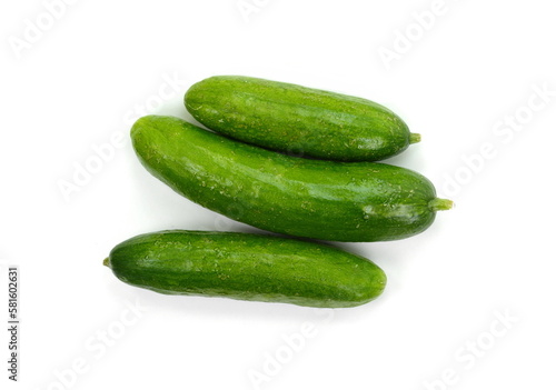 Fresh green cucumber isolated on white