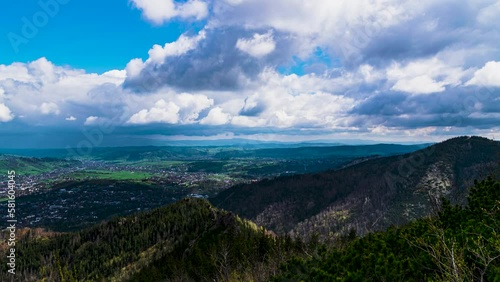 Time lapse of beautiful clouds rolling over Zakopane town in Polish Tatra mountains
