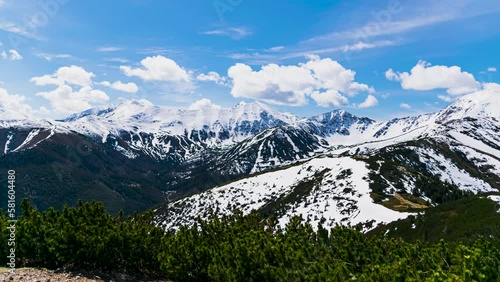 Time lapse of snowy mountain tops in Polish western tatra mountains